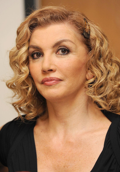 milly carlucci parrucca